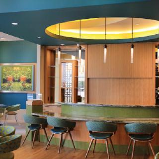 A modern lounge area with stylish seating and contemporary lighting.