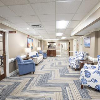 A modern and well-lit lobby area with comfortable seating and stylish decor.