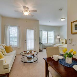A cozy and bright living room with comfortable furniture and tasteful decor.