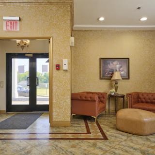 A welcoming lobby featuring comfortable seating and a well-lit entrance.