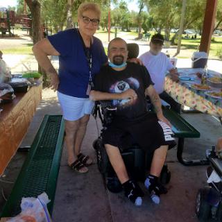 A joyful moment shared at a family picnic in the park.