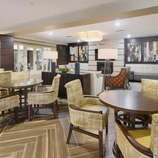 A modern lounge area with comfortable seating and stylish decor.