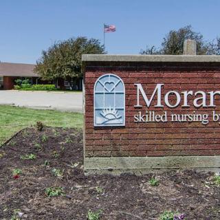 Entrance sign for a skilled nursing home facility.