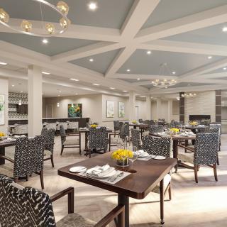 A modern dining area with elegantly set tables and stylish decor.