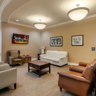 A cozy living room with comfortable seating and modern decor.