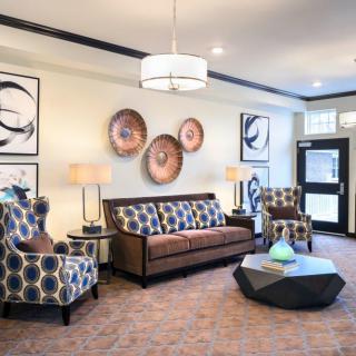 A modern lobby featuring stylish furniture and contemporary decor.