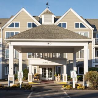 Front entrance of a hotel with classic architecture and welcoming design.