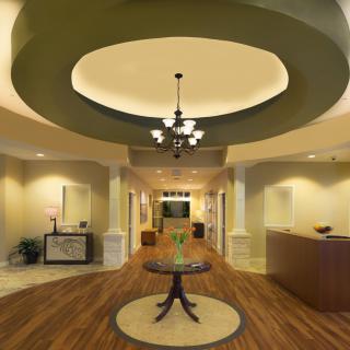 A modern lobby with elegant lighting and stylish furniture.