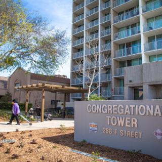 Congregational Tower, a modern residential building featuring landscaped outdoor spaces.