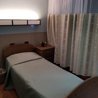 A serene spa room prepared for a relaxing massage session.