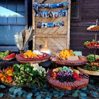 An array of vibrant fruits and vegetables beautifully displayed in baskets at a market.