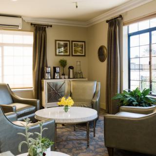 A cozy living room with stylish furniture and natural light.