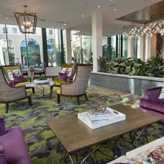 A modern lobby with comfortable seating and stylish decor.
