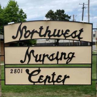 A sign for the Northwest Nursing Center located at 2801.