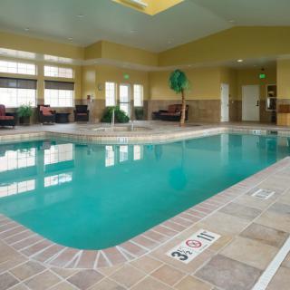 An inviting indoor swimming pool in a hotel setting.