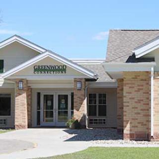 A welcoming entrance to a modern residential building.