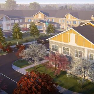 A peaceful suburban neighborhood with well-maintained houses and lush greenery.