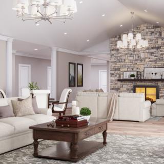 A cozy and elegant living room featuring a stone fireplace, plush sofas, and a stylish chandelier.