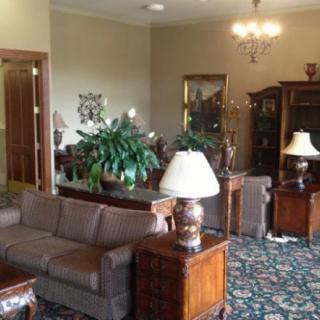 A traditional living room with classic furniture and elegant decor.