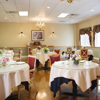 A cozy and elegantly arranged dining room, ideal for special occasions.