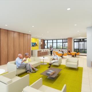 A modern waiting room with comfortable seating and contemporary design elements.