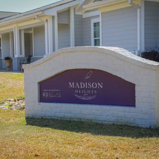 Sign in front of Madison Reserve Apartments.