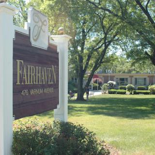 The welcoming entrance of Fairhaven, surrounded by lush greenery.