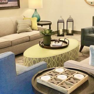 A cozy and stylish living room with comfortable seating and elegant decor.