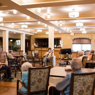 A peaceful gathering in a senior living community's activity room.