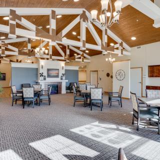 A spacious and well-lit lobby area with furniture arranged for comfort and style.