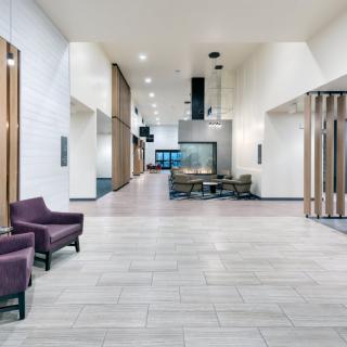 A modern lobby area with stylish furniture and contemporary design elements.