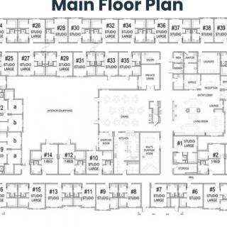 Main floor plan of a building displaying room layouts and corridors.
