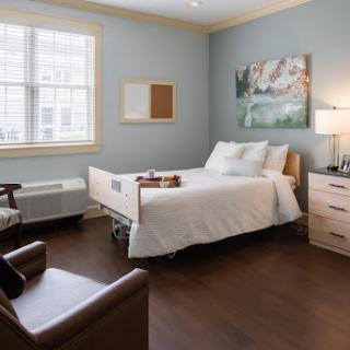 A modern and serene hospital room designed for patient comfort.