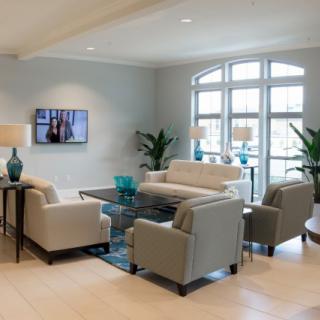 Modern living room with comfortable seating and stylish decor.