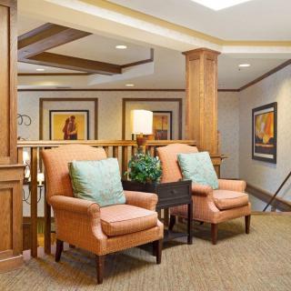 A cozy lobby area with comfortable seating and elegant decor.