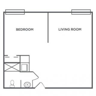 A simple floor plan showing a layout with a bedroom and living room.