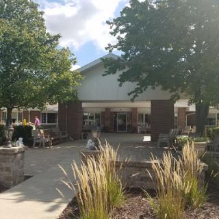 A welcoming community center surrounded by greenery.