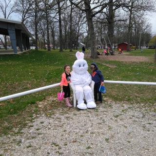 Children enjoying a day at the park with the Easter Bunny.