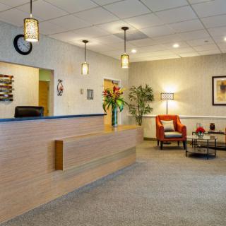 A welcoming reception area with comfortable seating and soft lighting.