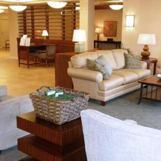 A modern and cozy lobby with comfortable seating and elegant decor.