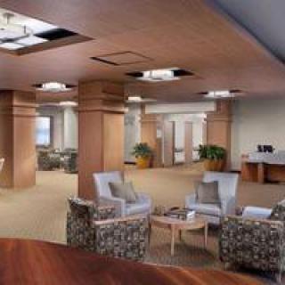 A modern office lobby with comfortable seating and elegant design.