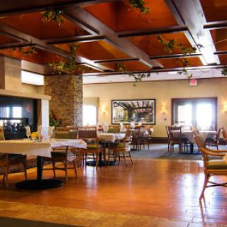 A cozy dining area with wooden accents and a warm ambiance.