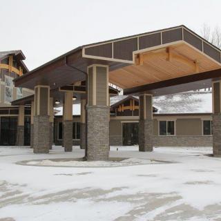 A snow-covered building entrance during winter.