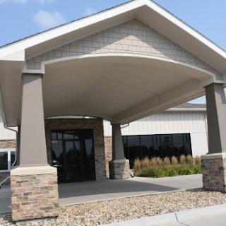 A welcoming entrance to a modern commercial building.