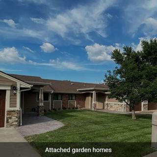 Suburban attached garden homes on a sunny day.