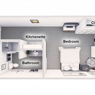 A compact studio apartment floor plan with designated areas for a kitchenette, bathroom, and bedroom.