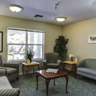 A cozy living room with comfortable seating and natural light.