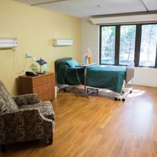 A serene hospital patient room designed for comfort and care.
