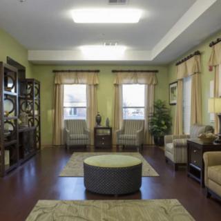A modern living room with comfortable seating and stylish decor.