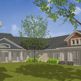 A serene courtyard surrounded by a traditional building with lush greenery and a central tree under a clear blue sky.